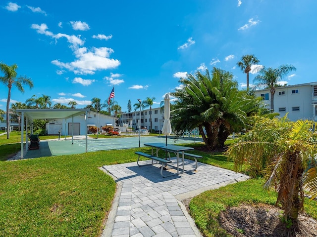 surrounding community featuring a lawn