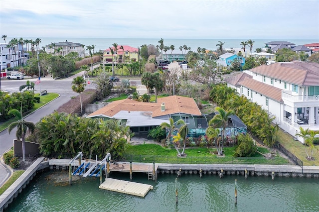 bird's eye view with a water view