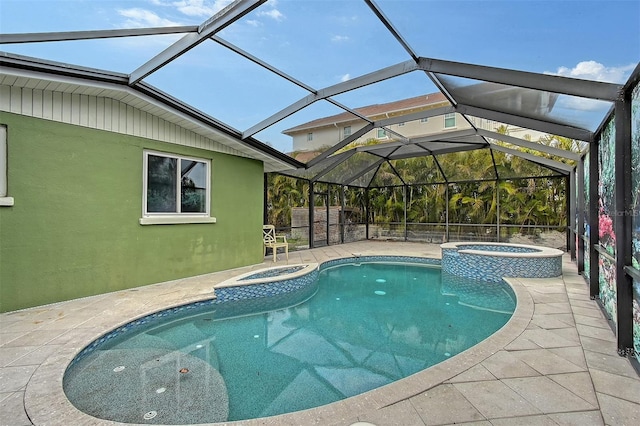 view of swimming pool with an in ground hot tub, glass enclosure, and a patio area