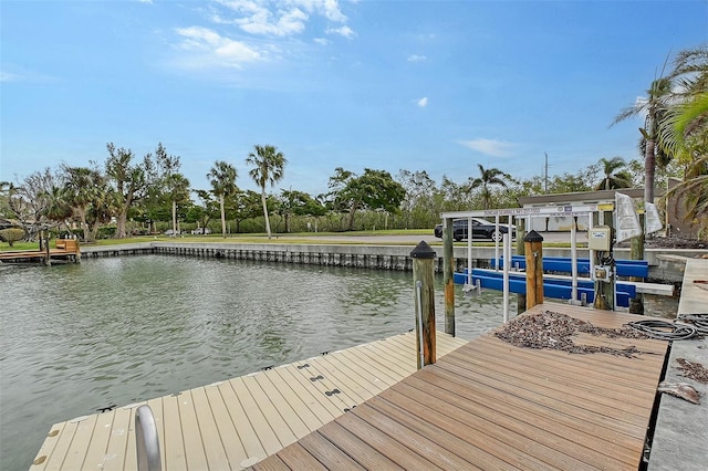 dock area with a water view