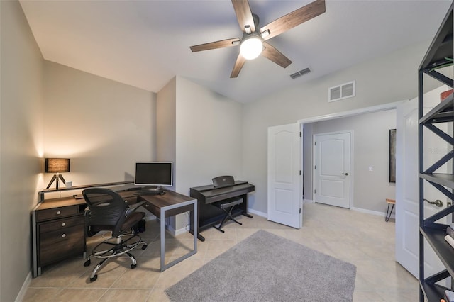 office area with ceiling fan and light tile patterned floors