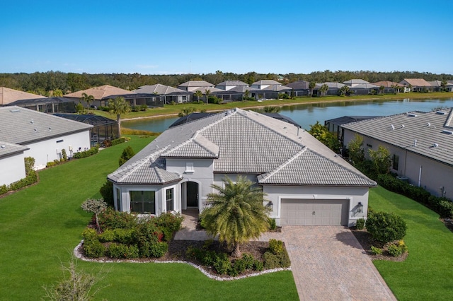 drone / aerial view featuring a water view