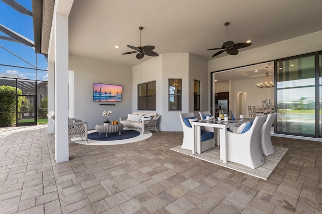 view of patio / terrace with an outdoor living space and ceiling fan