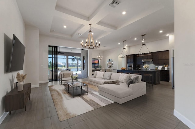 tiled living room with an inviting chandelier, coffered ceiling, and beam ceiling