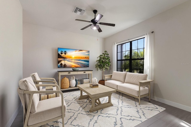 living room featuring ceiling fan