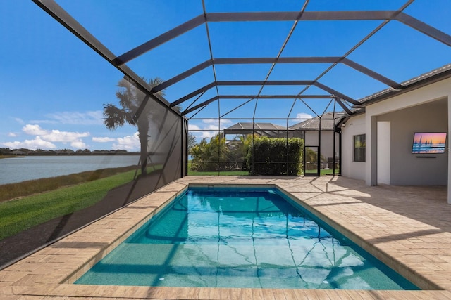 view of swimming pool featuring a lanai, a patio area, and a water view