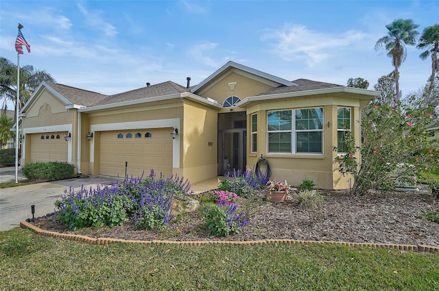 single story home with a garage