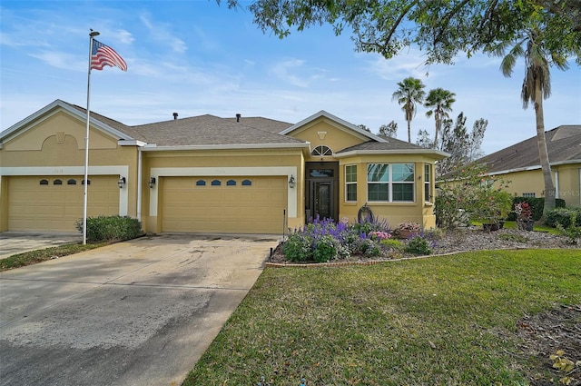 single story home with a garage and a front yard