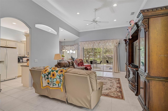 living room with crown molding, ceiling fan with notable chandelier, and light tile patterned floors