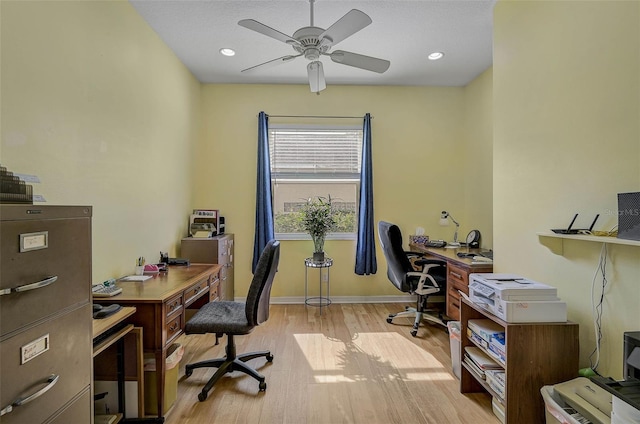 home office featuring ceiling fan and light wood-type flooring