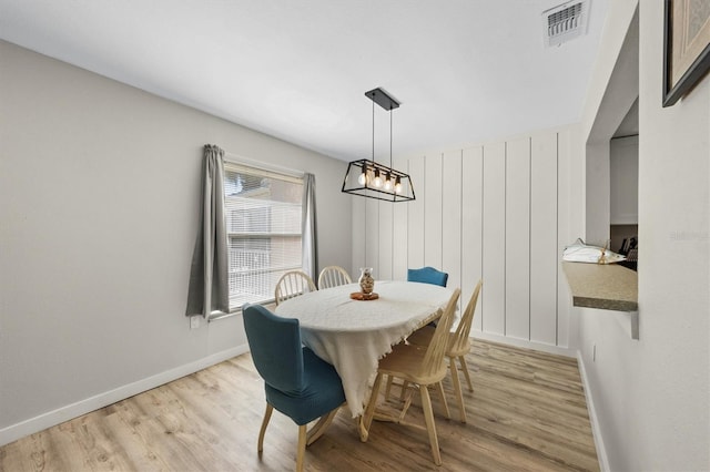 dining room with light wood-type flooring