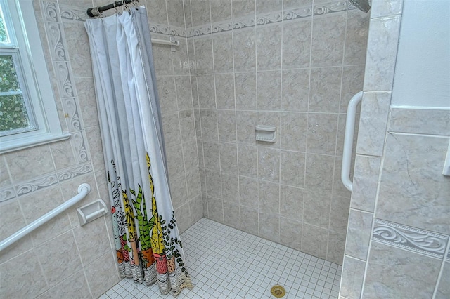 bathroom with a shower with shower curtain