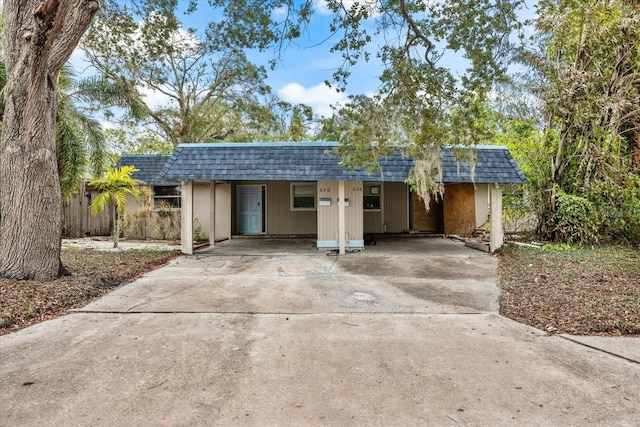 garage featuring a carport