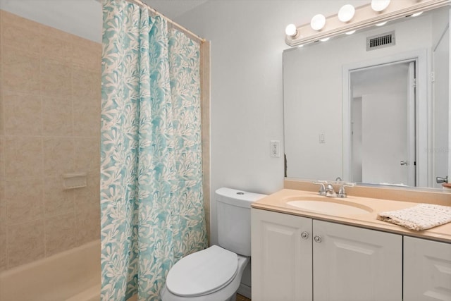 bathroom with shower / tub combo, visible vents, vanity, and toilet