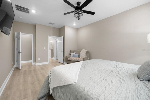 bedroom featuring ceiling fan and light hardwood / wood-style floors