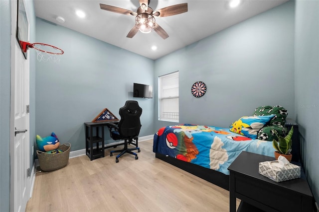 bedroom featuring light hardwood / wood-style floors and ceiling fan