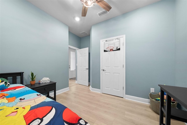 bedroom featuring ceiling fan and light hardwood / wood-style flooring