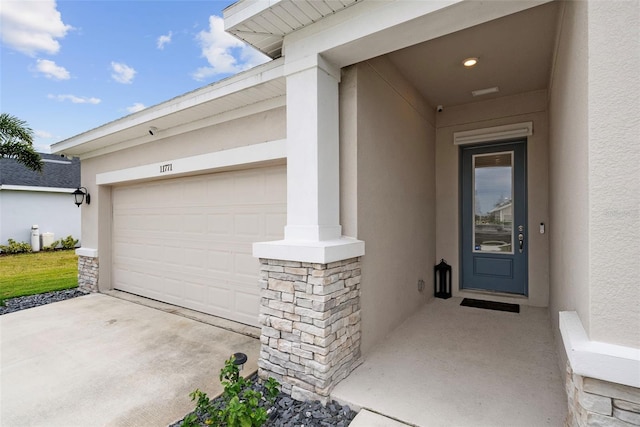 property entrance featuring a garage