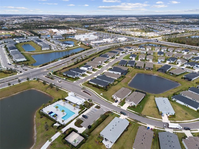 bird's eye view with a water view