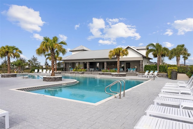 view of pool featuring a patio area