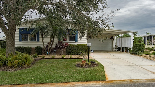 view of front facade with a garage, a carport, and a front yard