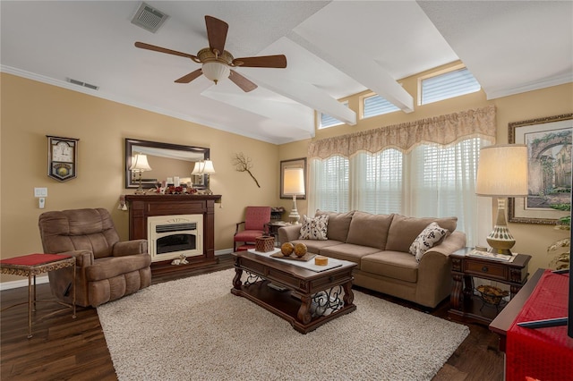 living room with ceiling fan, dark wood-type flooring, ornamental molding, and lofted ceiling