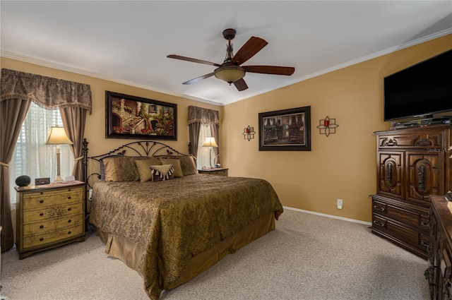 bedroom with ceiling fan, ornamental molding, and light colored carpet