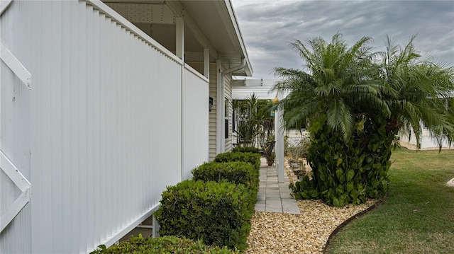 view of property exterior featuring a yard