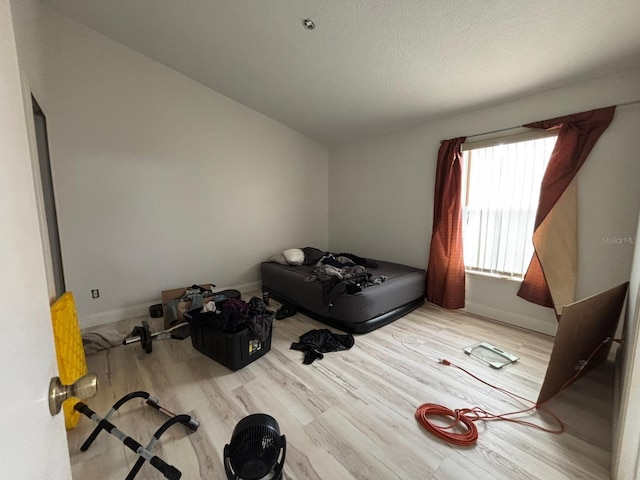 miscellaneous room with hardwood / wood-style flooring