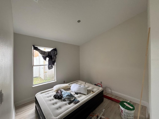 bedroom with light hardwood / wood-style flooring