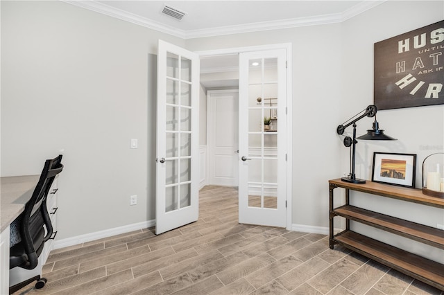 home office with ornamental molding and french doors