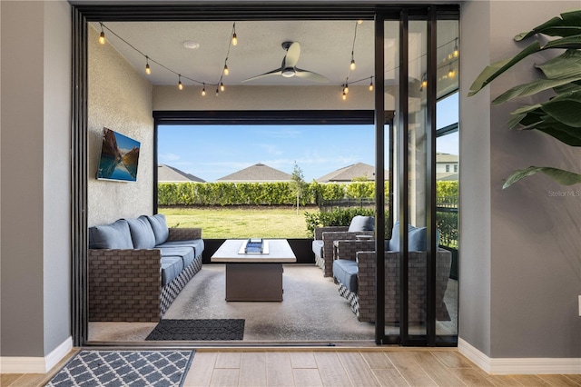 view of patio / terrace with ceiling fan and outdoor lounge area