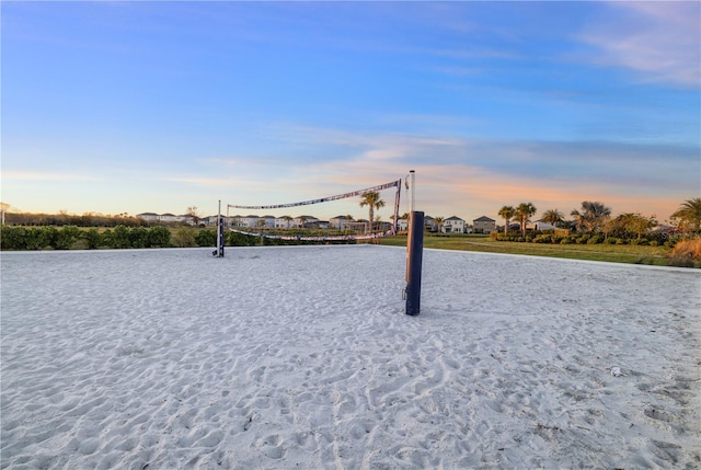 view of home's community featuring volleyball court