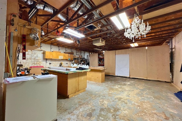 kitchen featuring kitchen peninsula, pendant lighting, and a kitchen island