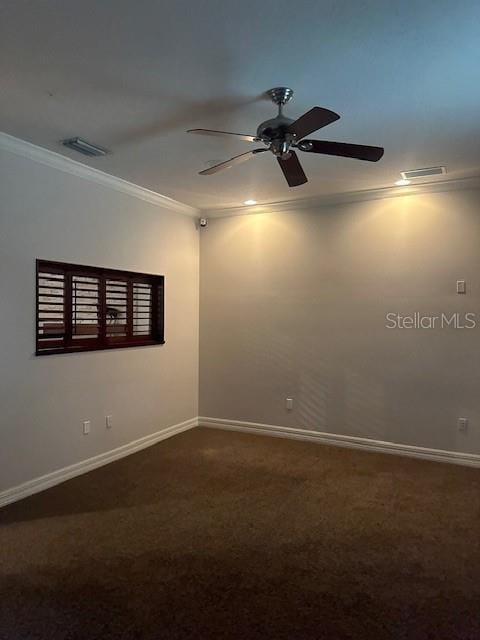 carpeted empty room featuring crown molding and ceiling fan