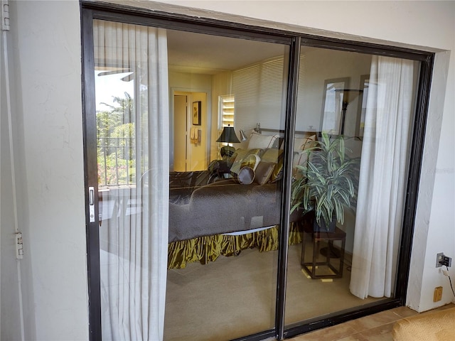 entryway featuring light tile patterned flooring