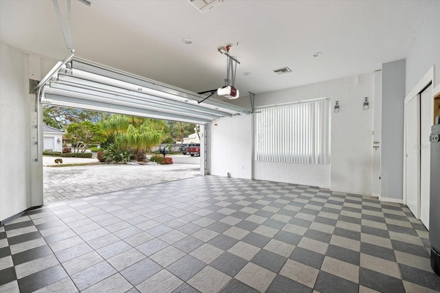 garage with a garage door opener