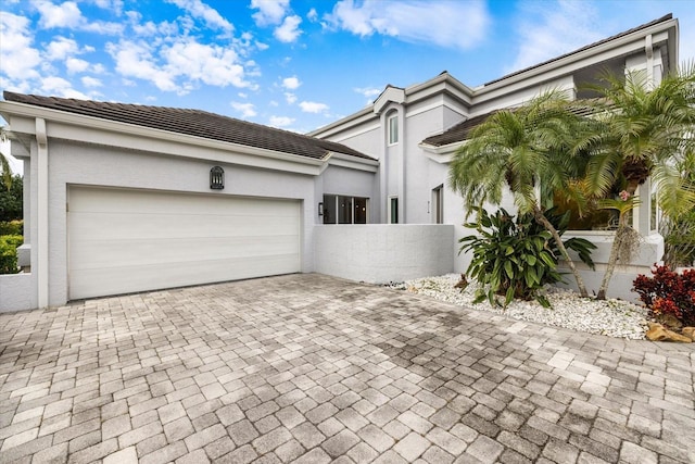 single story home with a garage