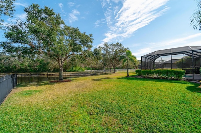 view of yard with a lanai