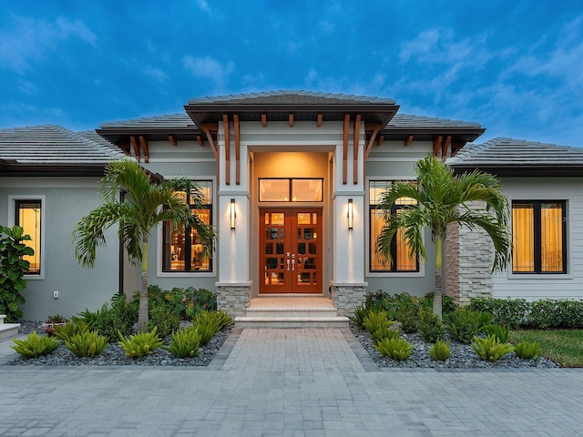 view of exterior entry with french doors