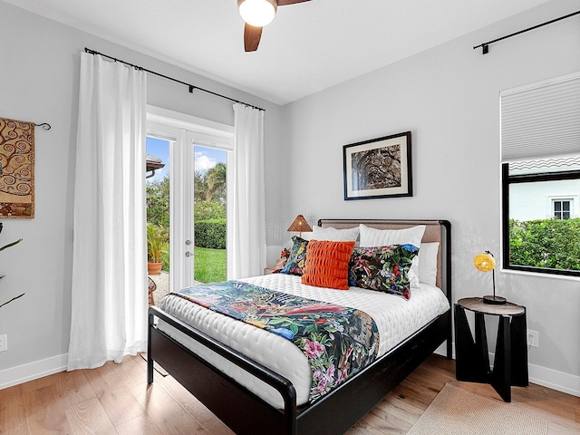 bedroom with french doors, ceiling fan, light wood-type flooring, and access to outside