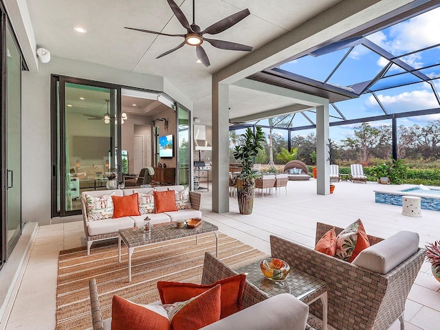 view of patio / terrace with outdoor lounge area, ceiling fan, and a lanai