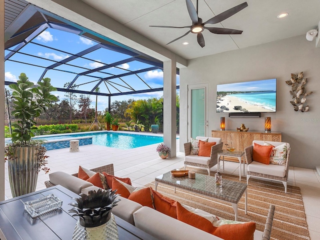 view of pool featuring a lanai, a patio area, and outdoor lounge area