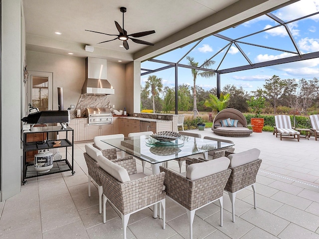 view of patio / terrace featuring a grill, a lanai, and exterior kitchen