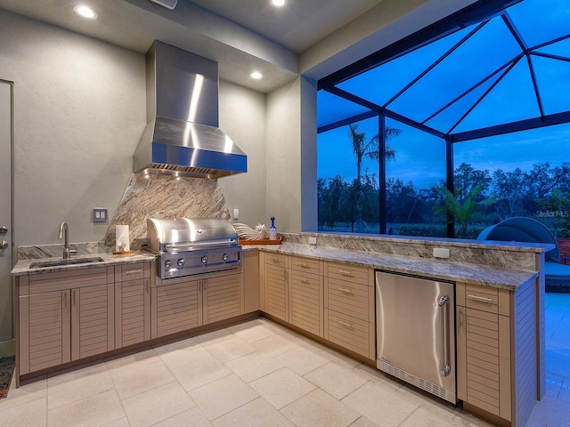 interior space with a grill, area for grilling, sink, and glass enclosure