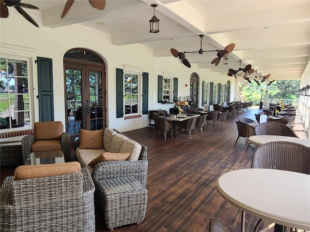 view of patio / terrace with outdoor lounge area, ceiling fan, and french doors