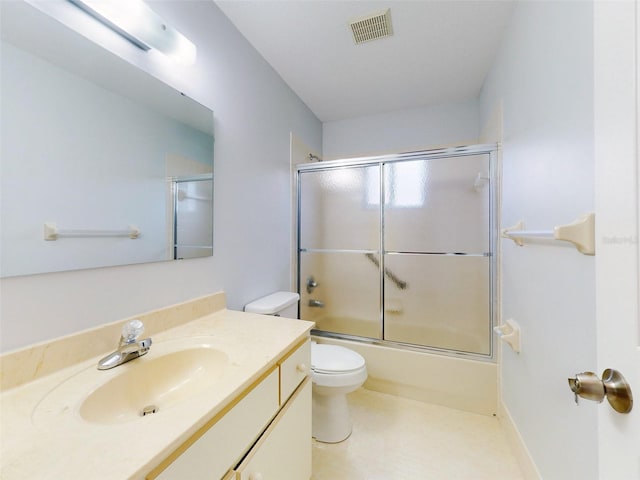 full bathroom with toilet, vanity, and combined bath / shower with glass door