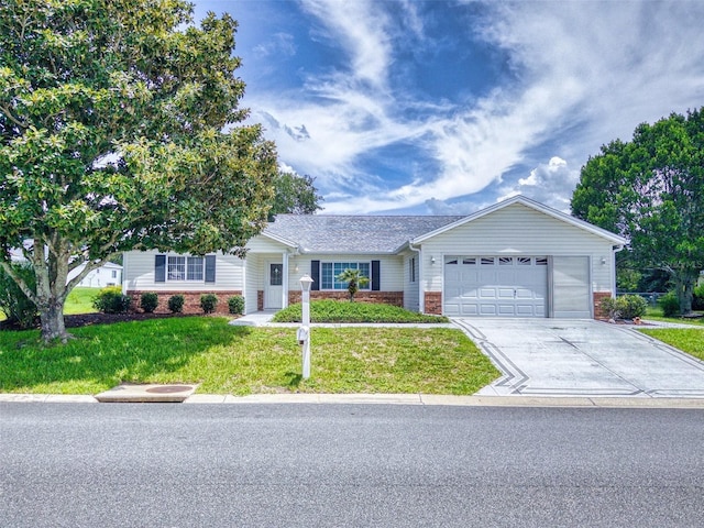 single story home featuring a front lawn and a garage