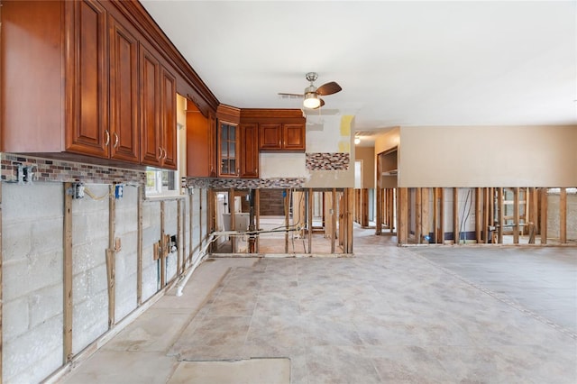 interior space featuring ceiling fan