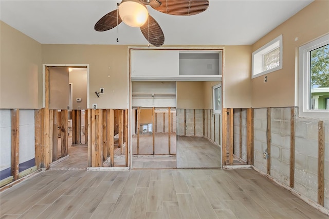 spare room featuring ceiling fan and light hardwood / wood-style flooring